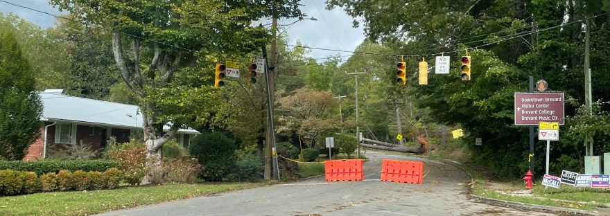 intersection blocked by fallen tree and power lines
